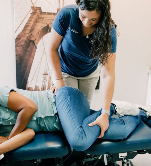 Dr. Dalton providing chiropractic care to patient at Seven Bridges Chiropractic